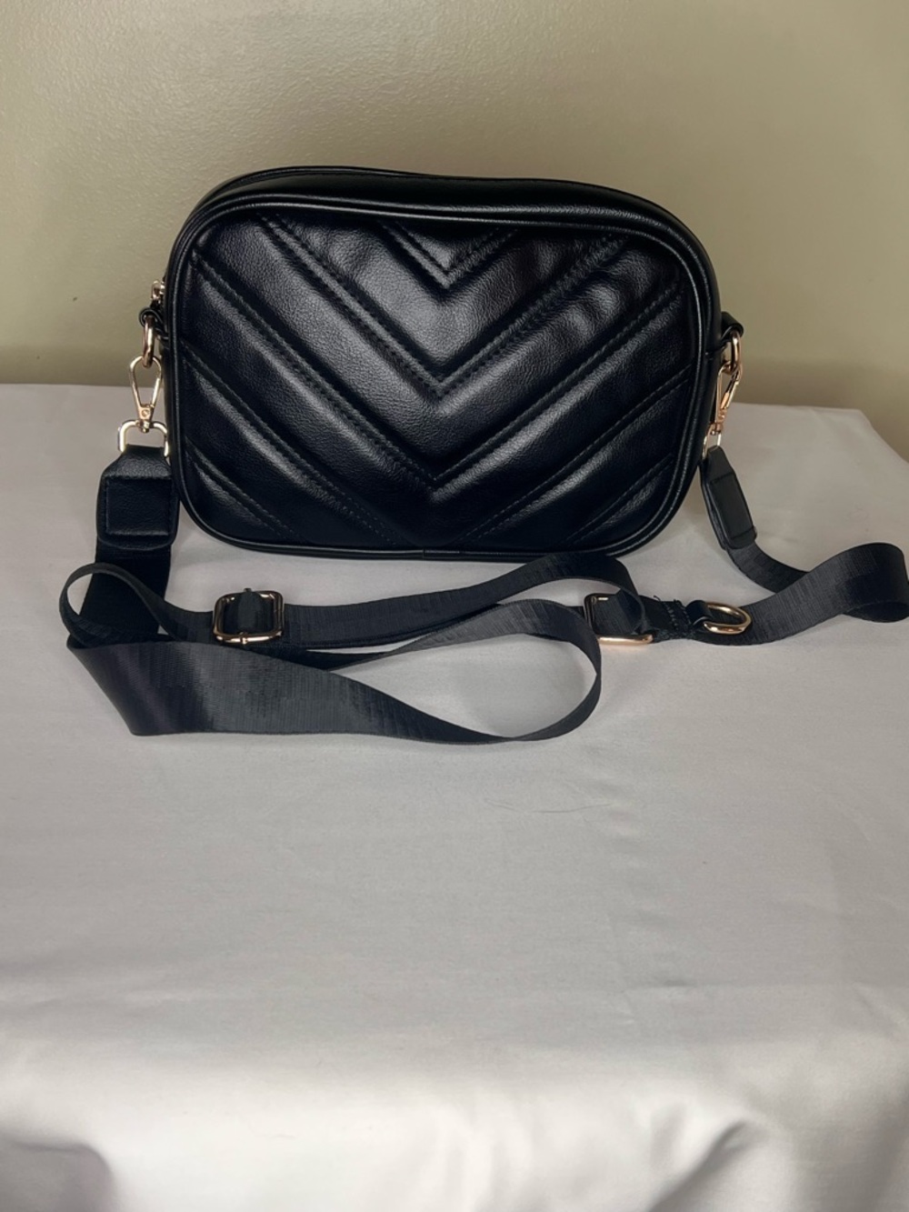 Black Quilted Chevron Crossbody Bag with Adjustable Strap
